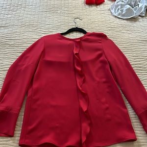 Red blouse-ruffle front/sleeve. Perfect to French tuck, blouson or leave loose.